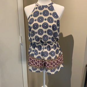 Cute halter romper with cut out back